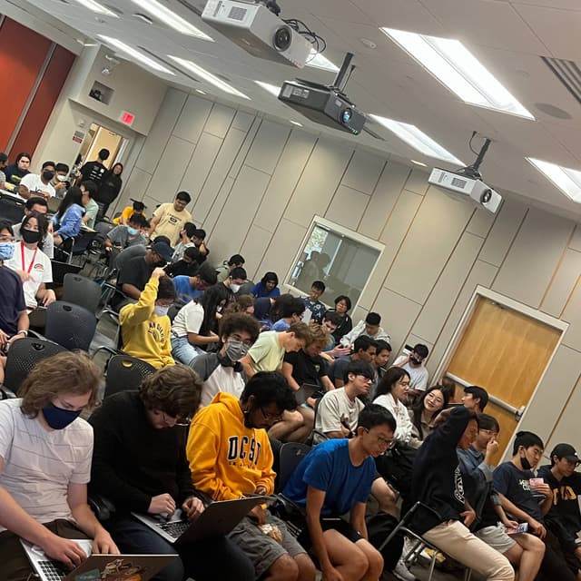 a room of people at ACM Cyber Kickoff 2022